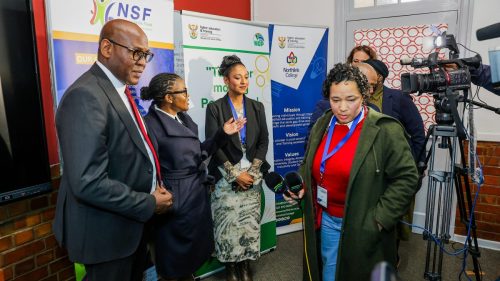 Minister joined by DDG and NSF Acting EO addressing the media.