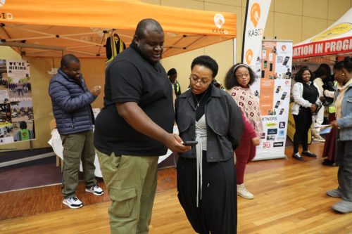 Meriam Malebo interacting with a stakeholder.