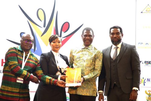The Deputy President receiving the Reconceptualised Human Resources Development Strategy and the Master Skills Plan
