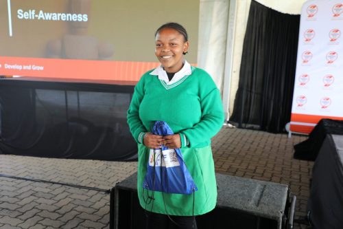 High school learner excited about winning a prize
