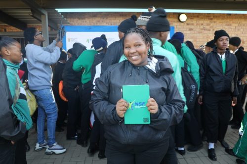 High school learner excited about winning a prize