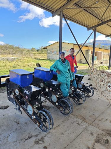 Lui Agri trainees with equipment.