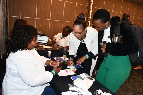 NSF officials engaging a stakeholder at the convention