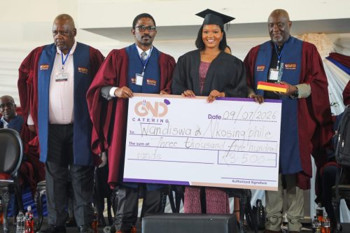 One of the top performing students, Wangiswa Nkosing’phile photographed with college council members