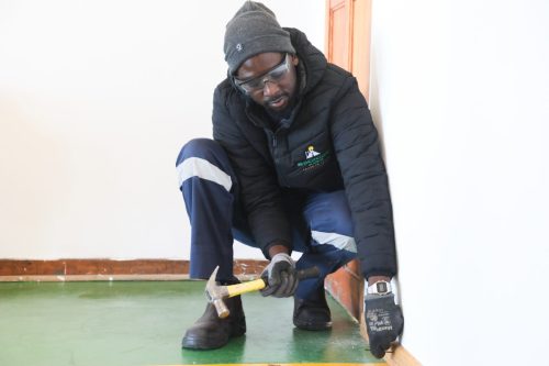 NSF beneficiary, Carpentry Apprentice.