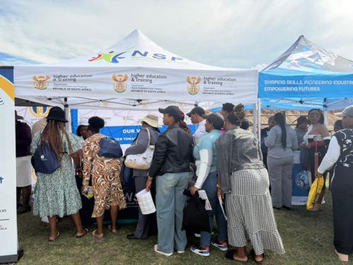 Community members gather at NSF exhibition stall
